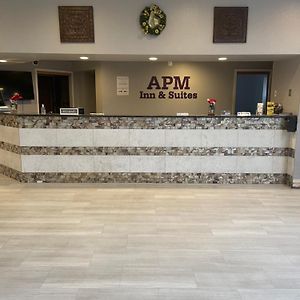 Apm Inn & Suites